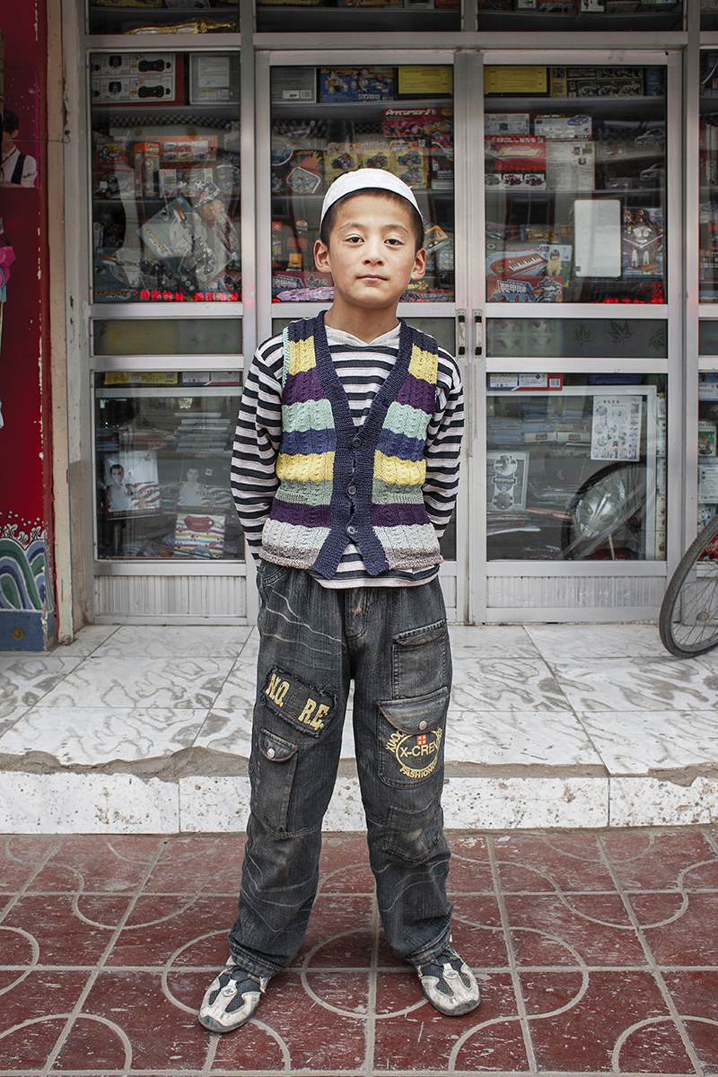 Shop vendor. Xiahe, China